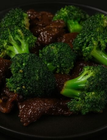Slices of beef stir-fried with fresh broccoli in a savory garlic soy sauce.