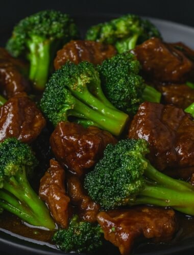 Slices of beef stir-fried with crisp broccoli florets coated in a savory garlic soy sauce.